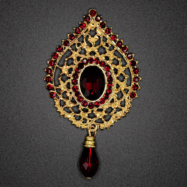 Light Gold Brooch With Red Stones